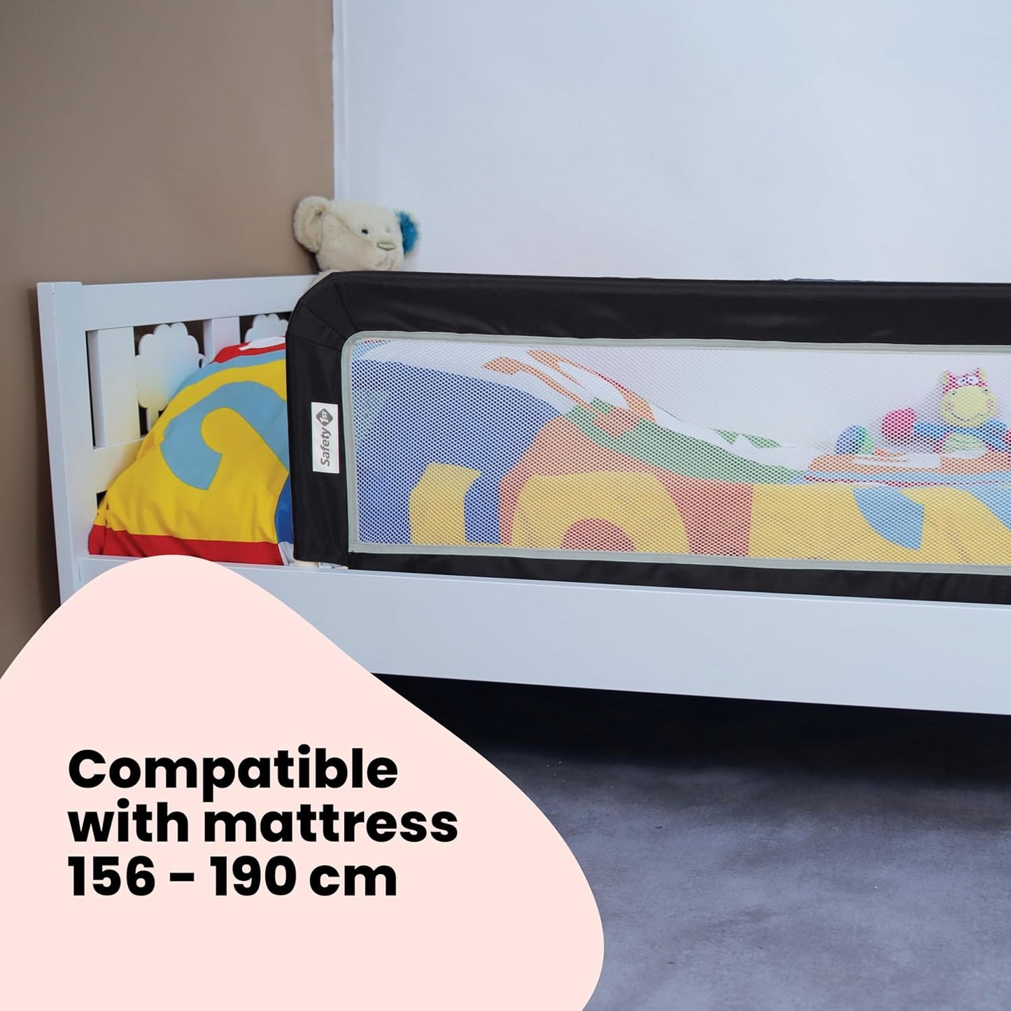 Securely fitted Safety 1st bed rail on wooden bed frame – safe sleep solution for toddlers, ideal for travel, from Thursday's Child Rental