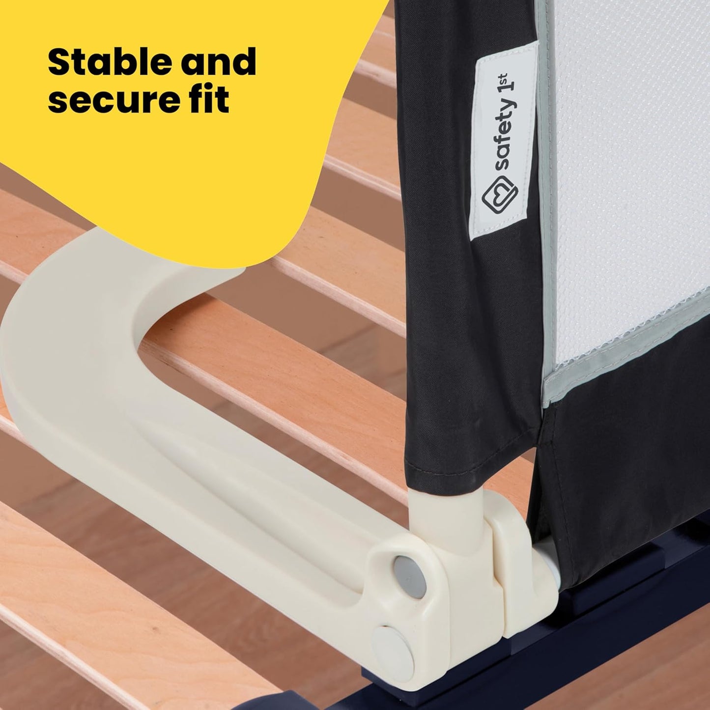 Securely fitted Safety 1st bed rail on wooden bed frame – safe sleep solution for toddlers, ideal for travel, from Thursday's Child Rental