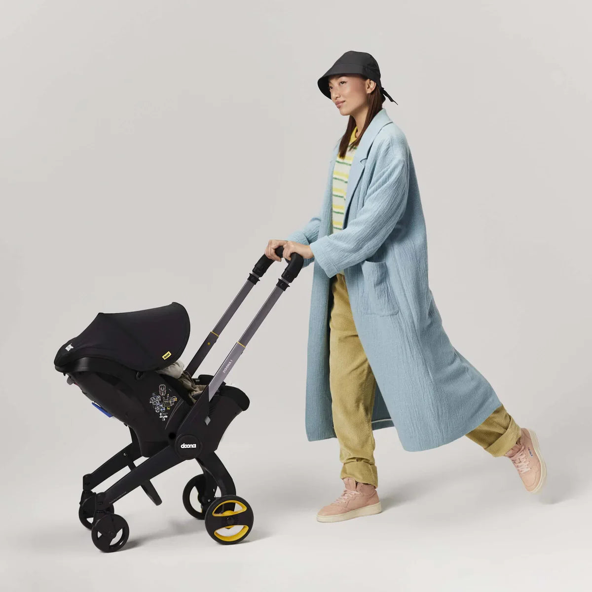 Doona i infant car seat and stroller in one, compact travel system with integrated wheels, suitable from birth – available for rental