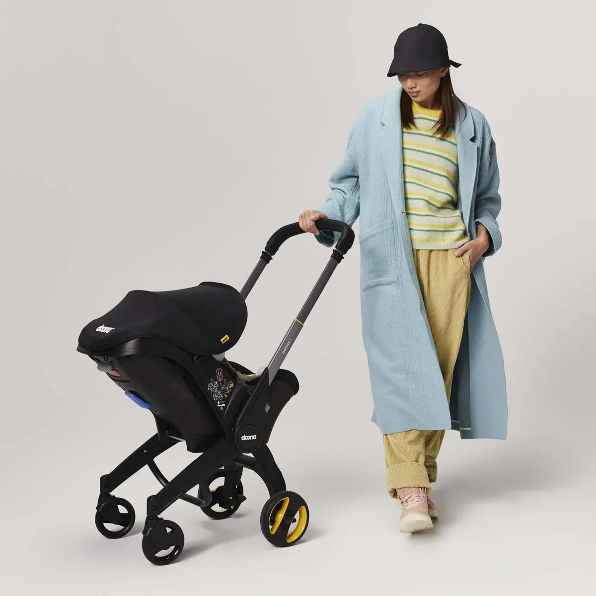 Doona i infant car seat and stroller in one, compact travel system with integrated wheels, suitable from birth – available for rental