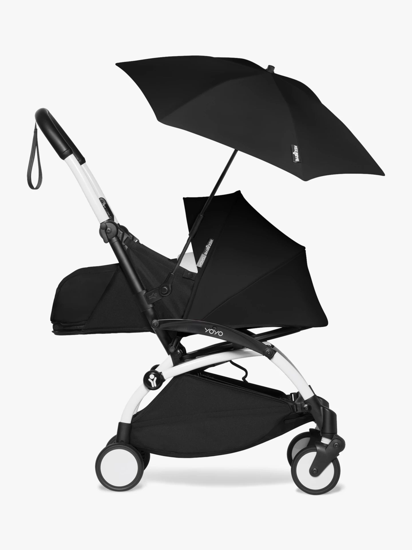Stokke babyzen yoyo parasol in black, a sleek official parasol that easily attaches to the YOYO frame. It can be easily attached and removed, making it perfect for attaching whilst on the move and protecting your child from the sun as it protects up SPF50 Available to hire from Thursdays Child Rental.