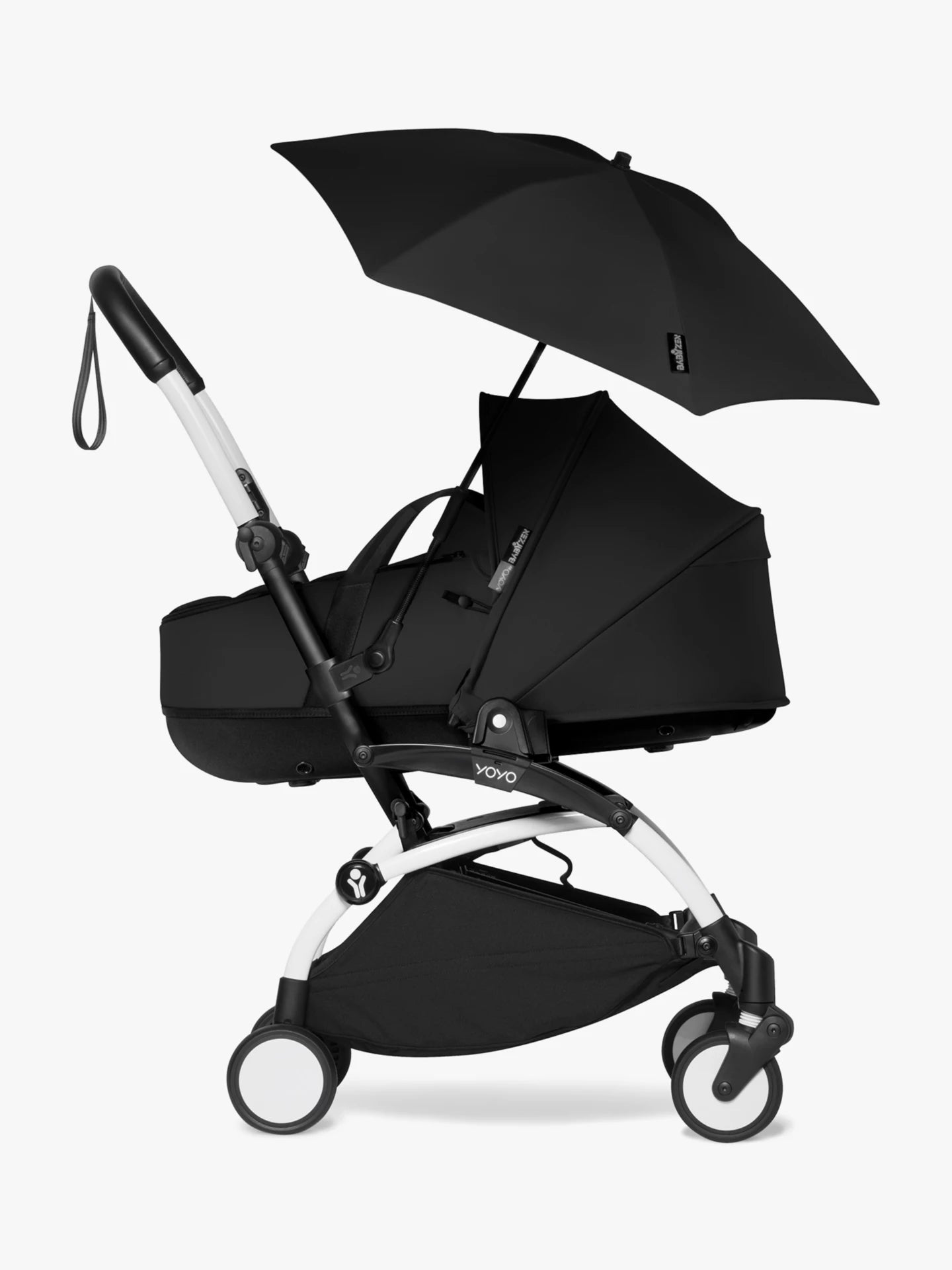 Stokke babyzen yoyo parasol in black, a sleek official parasol that easily attaches to the YOYO frame. It can be easily attached and removed, making it perfect for attaching whilst on the move and protecting your child from the sun as it protects up SPF50 Available to hire from Thursdays Child Rental.