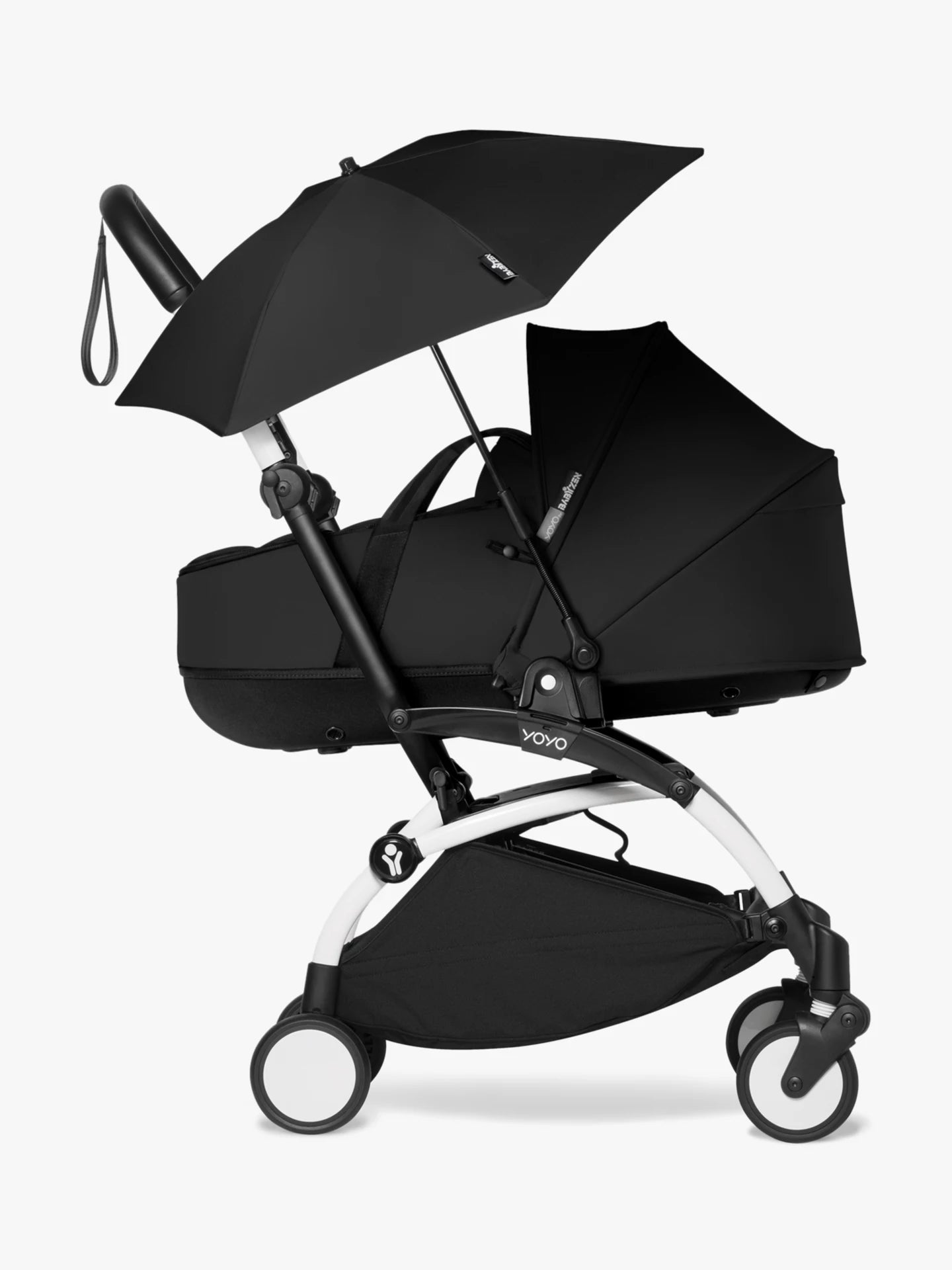 Stokke babyzen yoyo parasol in black, a sleek official parasol that easily attaches to the YOYO frame. It can be easily attached and removed, making it perfect for attaching whilst on the move and protecting your child from the sun as it protects up SPF50 Available to hire from Thursdays Child Rental.