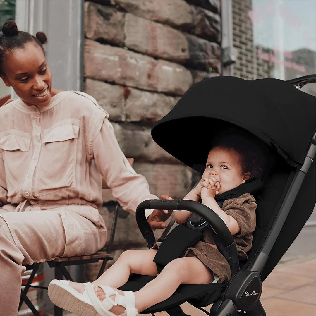 Silver Cross Clic 2 lightweight stroller in Space Black with one-hand fold, adjustable recline, and UPF50+ canopy—available for rental from Thursday’s Child.