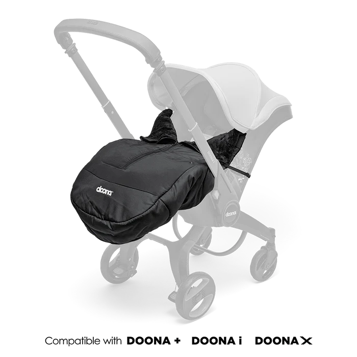 Doona Winter Cover fitted onto stroller in sleek black design.