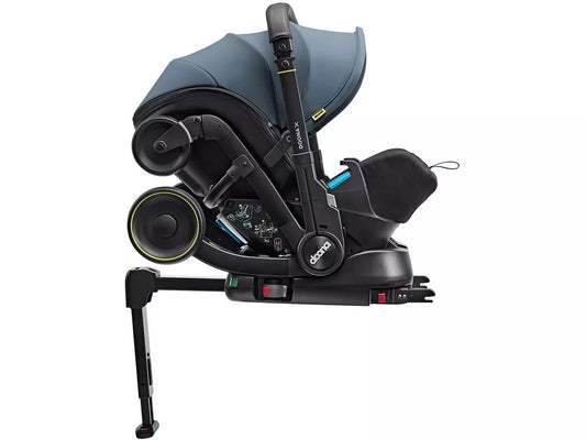Doona X ISOFIX Base for Doona car seat, shown installed in vehicle – premium baby travel base available for hire from Thursday’s Child Rental for easy, secure installation.