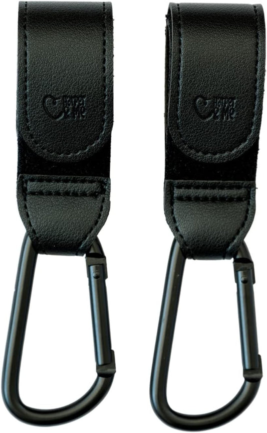 Two black straps with carabiners on a white background.
Black Harper & Me buggy clips attached to stroller handlebar – baby gear hire from Thursday’s Child Rental