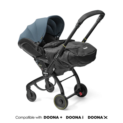 Doona Winter Cover accessory for stroller cold-weather protection.