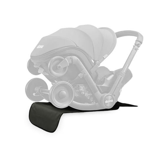 Doon Vehicle Seat Protector in use – durable, waterproof seat cover for child car seats, perfect for baby & toddler equipment rental from Thursday’s Child Rental.