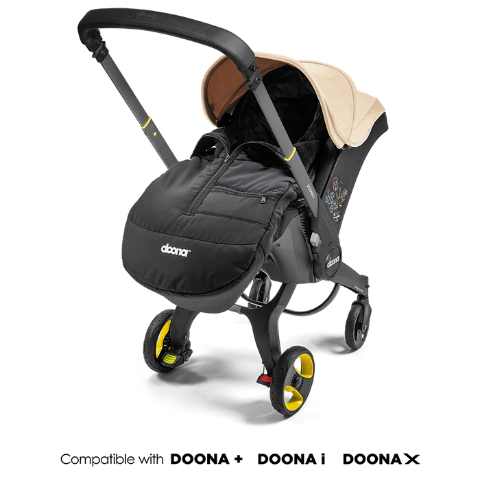 Doona X Footmuff with soft lining and weather-resistant exterior.
