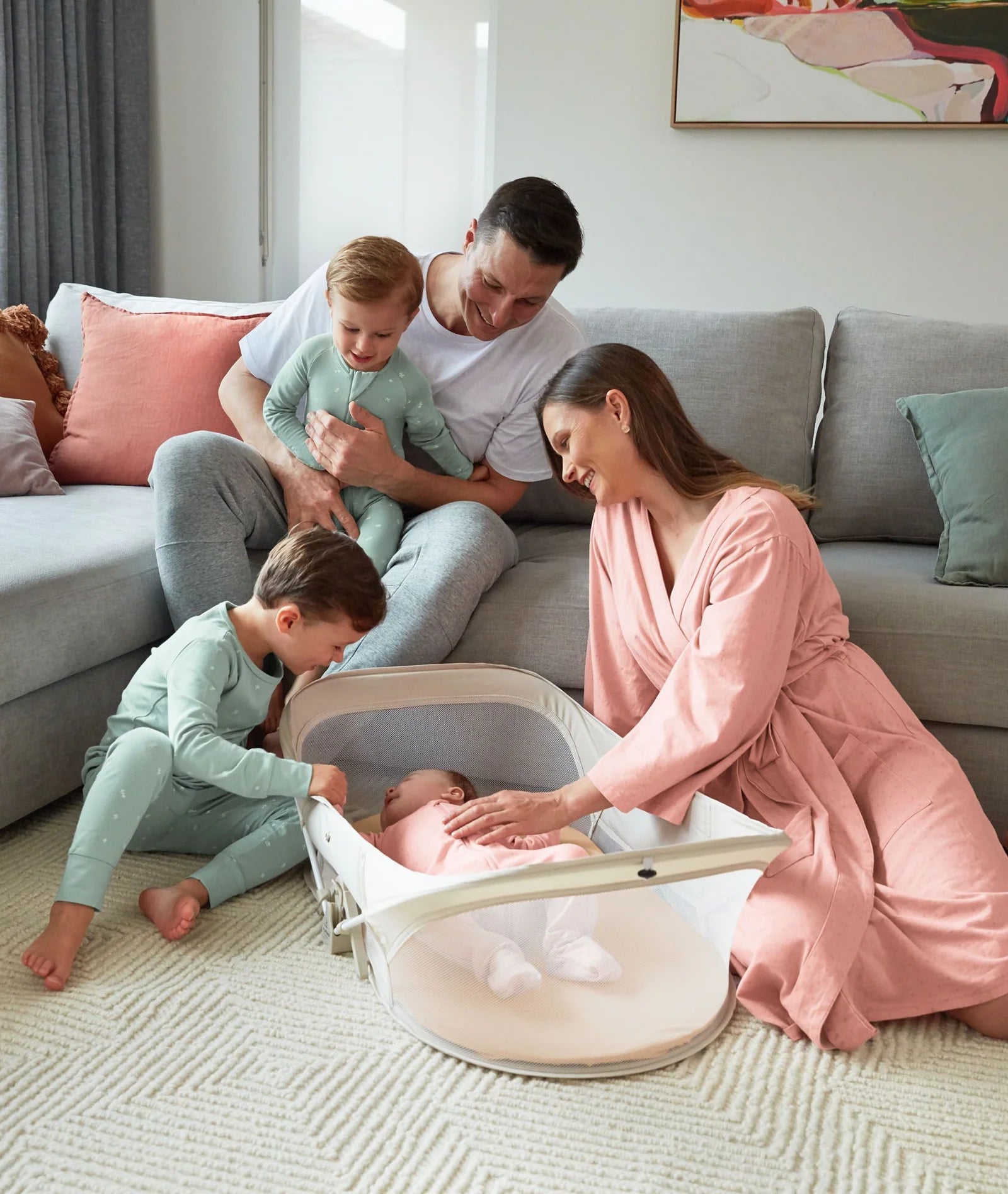 Easy Sleep Portable Crib set up in modern nursery, neutral Ecru color matches decor.
