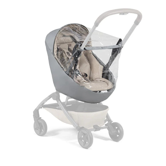 Joolz Aer+ Nest to Seat Raincover fitted on stroller, showing clear waterproof protection for both carrycot and seat. Keeps baby dry and visible in all weather conditions.